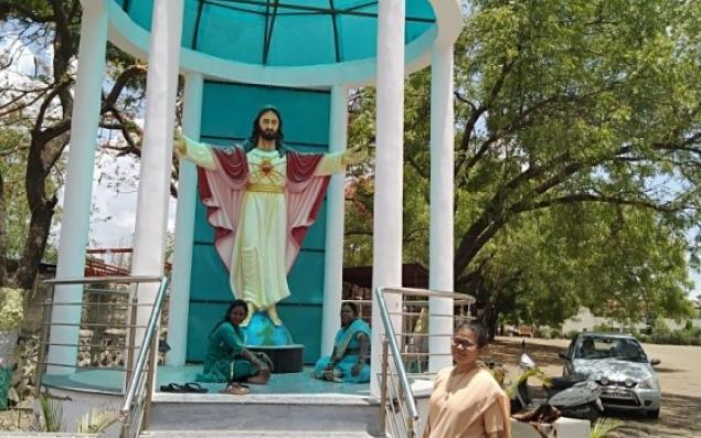 Anita Nazareth RSCJ with the statue of Jesus